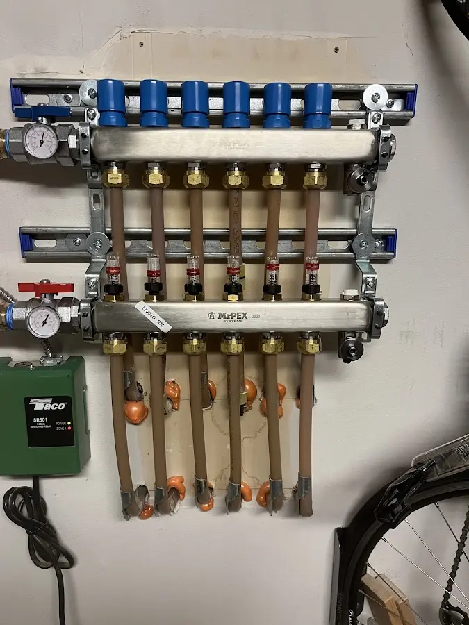 Plumber performing Gas Leak Detection at a residential property in Chincoteague